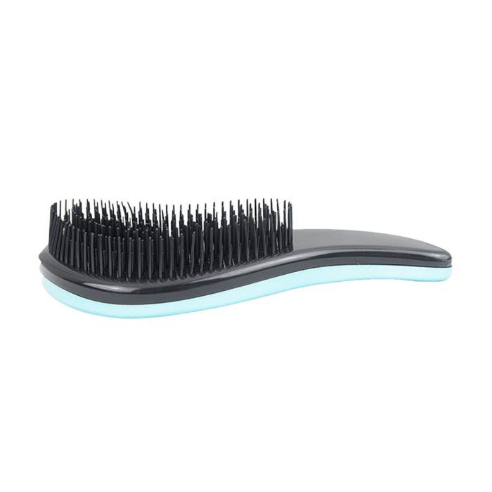 cepillo chroma brush turquesa desde el lado con las púas hacia arriba