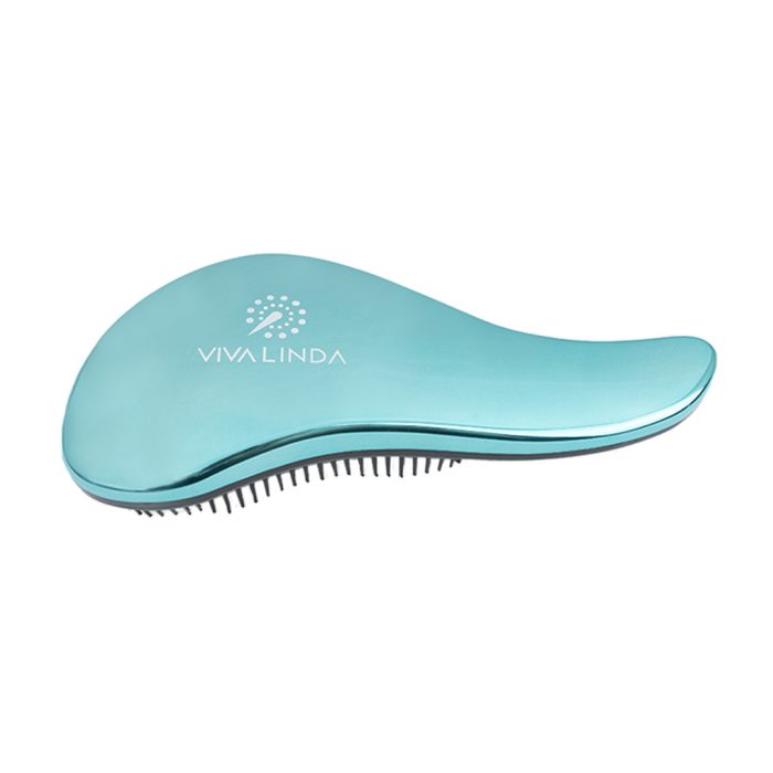 cepillo chroma brush turquesa desde el lado con las púas hacia abajo y el logo viva linda estampado en su trasera